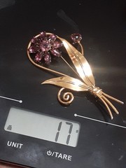 Sterling silver gold plated prong set purple glass flower & stem leaf brooch