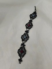 Black Enamel Ornate Victorian Inspired Bracelet With Blue And Crimson Stones