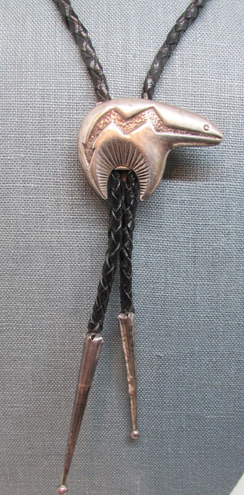 VINTAGE SOUTHWEST N.A. STERLING BEAR BOLO TIE W/TUFA CASTING
