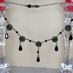 Vintage-style necklace and earrin black floral connectors and tear drop crystals