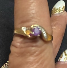 Vintage Style ring features a gold band with a prominent purple stone 14 ct Gold