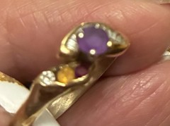 Vintage Style ring features a gold band with a prominent purple stone 14 ct Gold
