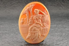 Vintage shape shell cameo, “Woman Sitting on a Terrace” (52.5ct), sign by artist