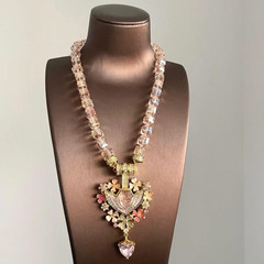Pink beaded vintage sleeping angel pendant necklace