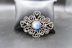Vtg Silver Tone Scroll Work W/ Blue Irredescent Center Cabochon Bead Brooch 2.5″