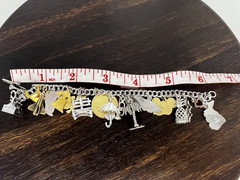 Vintage Charm Bracelet 1980s Style with 18 charms. 6.5″ 45.8 grams Sterling, GF