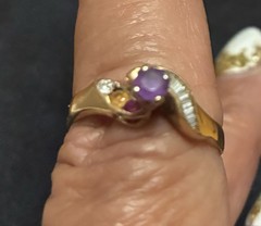 Vintage Style ring features a gold band with a prominent purple stone 14 ct Gold