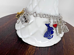 Vintage Charm Bracelet 1980s Style with 18 charms. 6.5″ 45.8 grams Sterling, GF