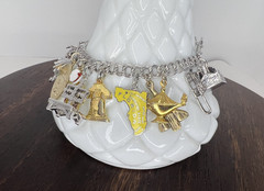 Vintage Charm Bracelet 1980s Style with 18 charms. 6.5″ 45.8 grams Sterling, GF