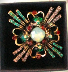 large brooch gold tone with faux opal + red, green &clear zircons