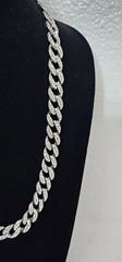 Cuban chain necklace silver tone one side many crystals other side plain.
