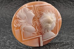 Vintage oval shape shell cameo “Two Girls” (64.0ct), sign by artist with case.