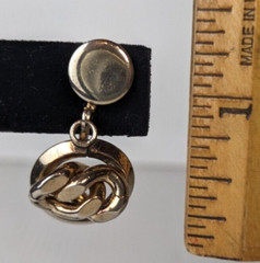 Vintage gold tone earrings knot design screw back