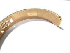 AVON GOLD TONE CUFF BRACELET WITH FAUX FOIL OPAL DESIGN VINTAGE