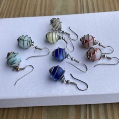 4 pr. vintage wire wrapped cased glass marble dangle, / pierced earrings