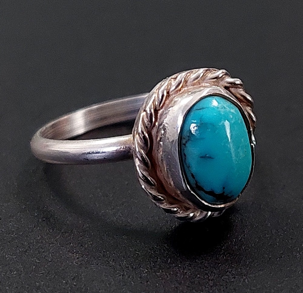 Sterling Silver ring with robin egg blue turquoise stone! Size 4.5, 2.5 grams!