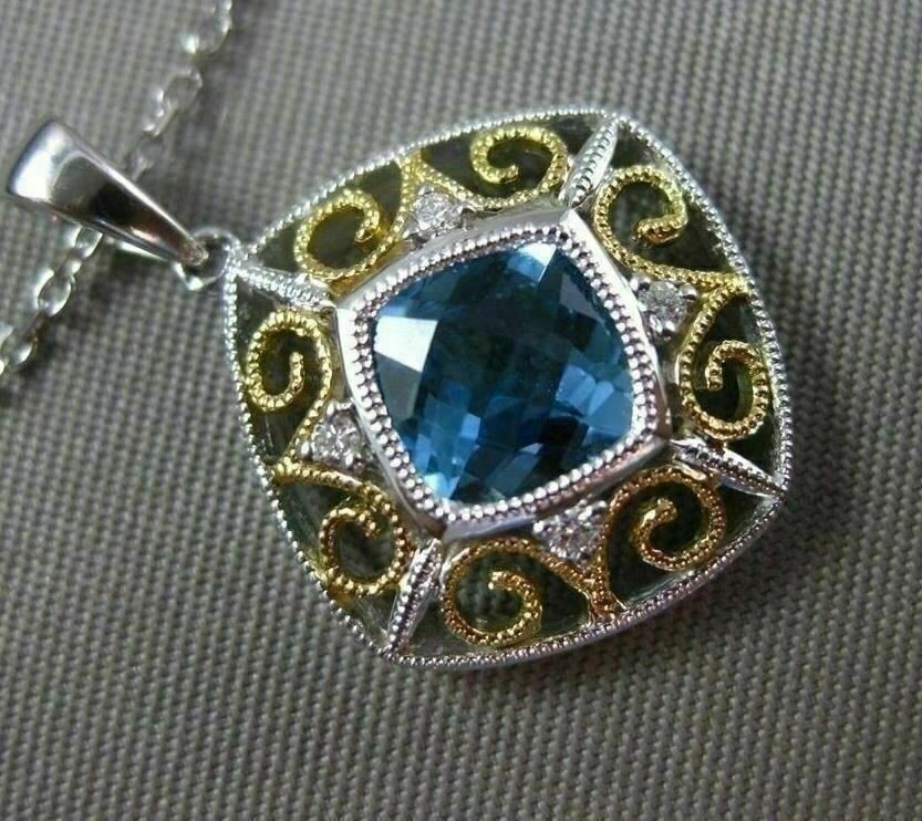ESTATE 1.14CT DIAMOND & BLUE TOPAZ 14KT 2 TONE GOLD OPEN SQUARE FLOATING PENDANT