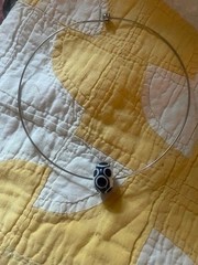 SS NECK WIRE WITH BLACK & WHITE GLASS BEAD, FROM PARIS – NEW, NEVER WORN