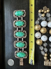 2 vintage bracelets: one circa early 90’s, the other is older