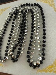 26″ continuous loop / no clasp, lightweight plastic faceted bead necklace in bla