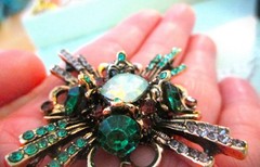 large brooch gold tone with faux opal + red, green &clear zircons