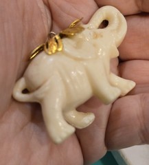 Vintage Celluloid Lucky Elephant Charm Pendant Faux Ivory Raised Trunk Gold Tone