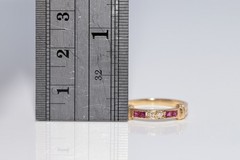 Vintage Circa 1980s 18k Gold Natural Diamond And Caliber Cut Ruby Ring