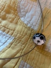 SS NECK WIRE WITH BLACK & WHITE GLASS BEAD, FROM PARIS – NEW, NEVER WORN
