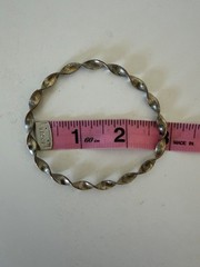 Twisted Metal Bangle Bracelet in Silver Tone