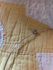 SS NECK WIRE WITH BLACK & WHITE GLASS BEAD, FROM PARIS – NEW, NEVER WORN