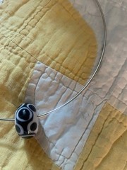SS NECK WIRE WITH BLACK & WHITE GLASS BEAD, FROM PARIS – NEW, NEVER WORN