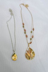 Set of 2 Vintage 90’s earth toned green, brown, gold pendant necklaces