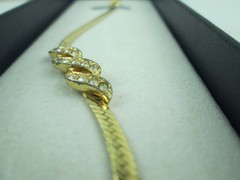 1986 SPARKLE TWIST Bracelet by AVON 6.5” Rein stones Gold Tone