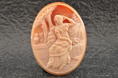 Vintage shape shell cameo, “Woman Sitting on a Terrace” (52.5ct), sign by artist