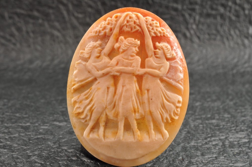 Vintage oval shell cameo, “Dancing Goddesses” (38.5ct) sign by artist with case.