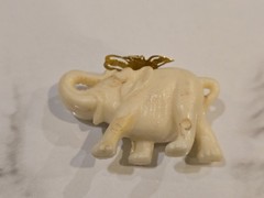 Vintage Celluloid Lucky Elephant Charm Pendant Faux Ivory Raised Trunk Gold Tone