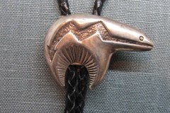 VINTAGE SOUTHWEST N.A. STERLING BEAR BOLO TIE W/TUFA CASTING