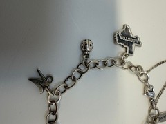 James Avery Sterling silver Charm bracelet with 6 Charms 7.5 Inch. 18+ Grams.