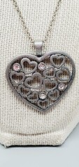 American Eagle Silvertone 1.75″ multiple hearts within pendant necklace 32″ te01