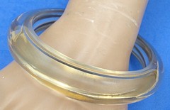VINTAGE BCBG MAXAZRIA ASYMMETRICAL BANGLE BRACELET CLEAR GOLD TONE BANDS INSIDE