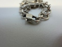 James Avery Sterling silver Charm bracelet with 6 Charms 7.5 Inch. 18+ Grams.