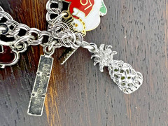 Vintage Charm Bracelet 1980s Style with 18 charms. 6.5″ 45.8 grams Sterling, GF