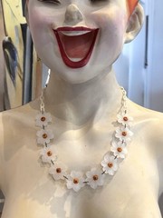 Vintage Lucite or acrylic whitish flowers with orange centers necklace