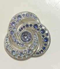 Silvertone Swirl Rhinestone Pin Brooch Blue Stones