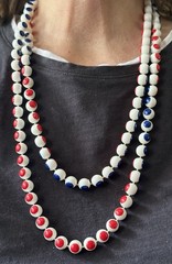 Vintage 1950 red, white andblue plastic puzzle bead necklace