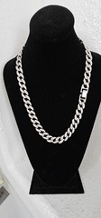 Cuban chain necklace silver tone one side many crystals other side plain.