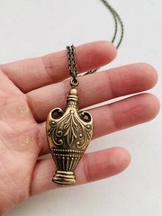 Vintage Style Bronze Tone Egyptian Revival Intricate Vase Pendant Necklace