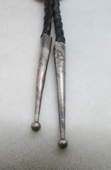 VINTAGE SOUTHWEST N.A. STERLING BEAR BOLO TIE W/TUFA CASTING