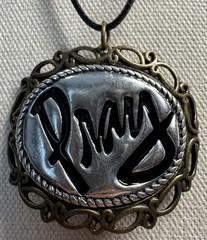 Beautiful Vintage Brassy & Silvertone Oval Pray Pendant On Cord Necklace