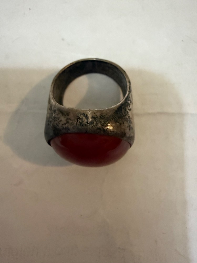 vintage silver dome-style cocktail ring featuring a prominent, smooth red caboch